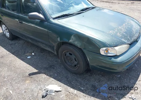 2001 Chevrolet Geo Prizm Lsi from USA, damaged, VIN 1Y1SK52811Z427120